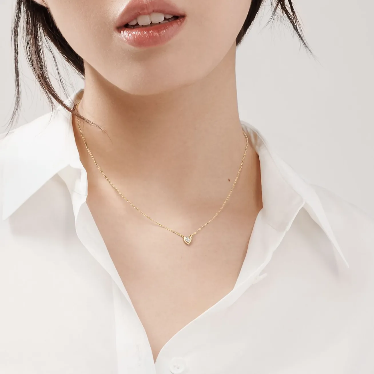 Tiffany & Co. Elsa Peretti® Diamonds by the Yard® heart necklace in 18k gold. | ^ Necklaces & Pendants|Gold Jewelry