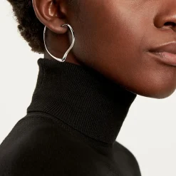 Tiffany & Co. Elsa Peretti® Open Heart hoop earrings in sterling silver. More sizes available. | ^ Earrings|Bold Silver Jewelry