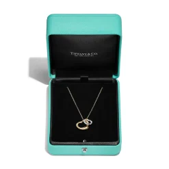 Tiffany & Co. Elsa Peretti® Open Heart Pendant in Yellow Gold and Sterling Silver | ^ Necklaces & Pendants|Gifts for Her