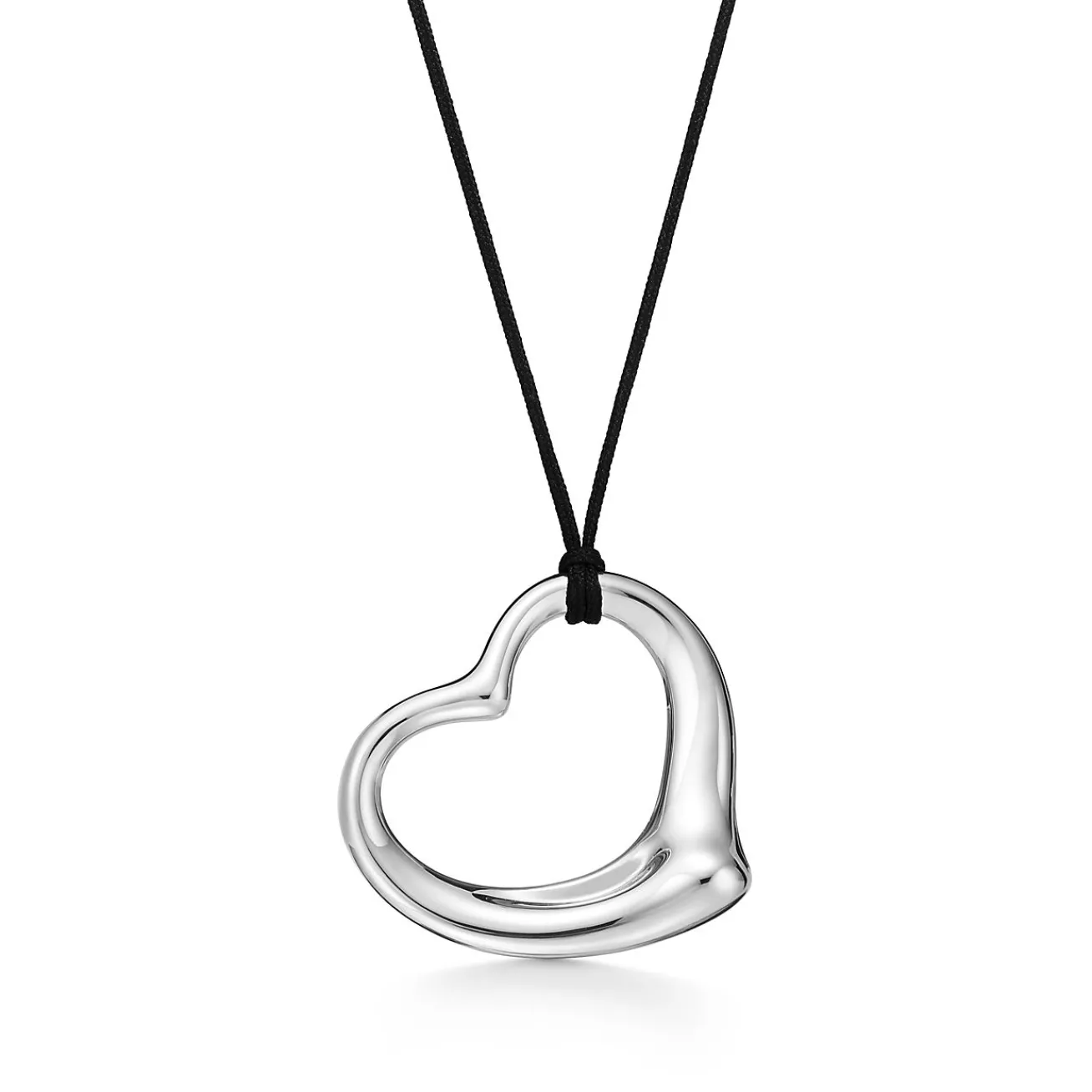Tiffany & Co. Elsa Peretti® Open Heart pendant in sterling silver on a 16" black silk cord. | ^ Necklaces & Pendants|Sterling Silver Jewelry