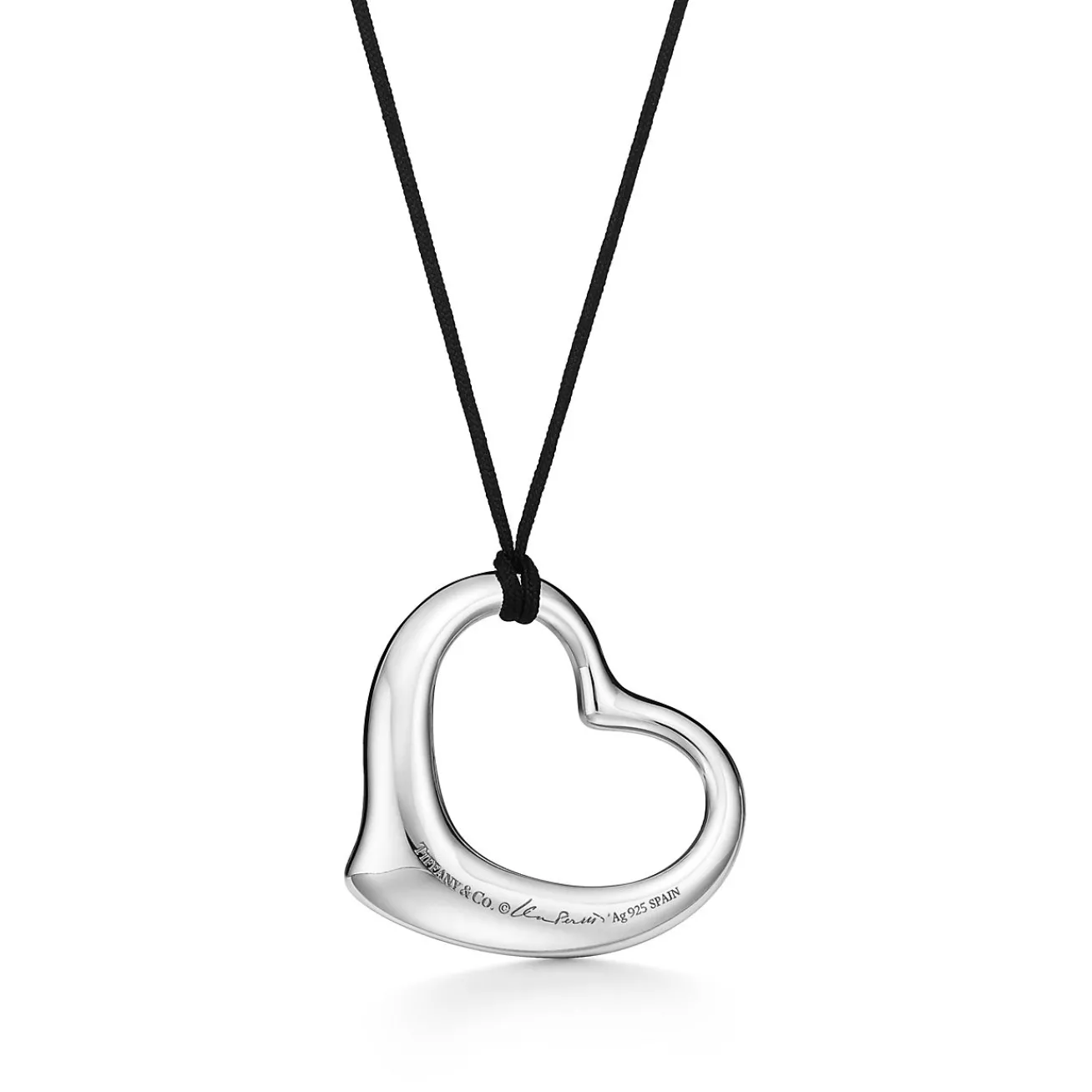 Tiffany & Co. Elsa Peretti® Open Heart pendant in sterling silver on a 16" black silk cord. | ^ Necklaces & Pendants|Sterling Silver Jewelry