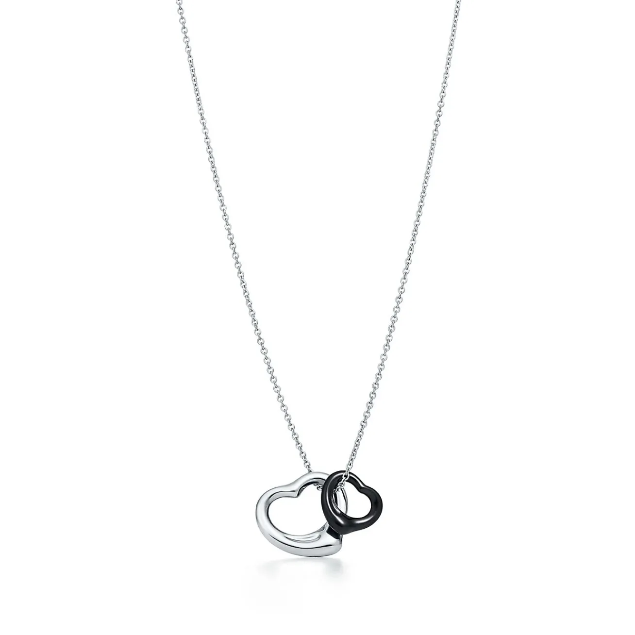 Tiffany & Co. Elsa Peretti® Open Heart pendant in sterling silver and black jade. | ^ Necklaces & Pendants|Sterling Silver Jewelry