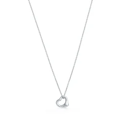 Tiffany & Co. Elsa Peretti® Open Heart pendant in platinum with diamonds, 11 mm wide. | ^ Necklaces & Pendants|Platinum Jewelry