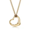 Tiffany & Co. Elsa Peretti® Open Heart pendant in 18k gold. | ^ Necklaces & Pendants|Gold Jewelry