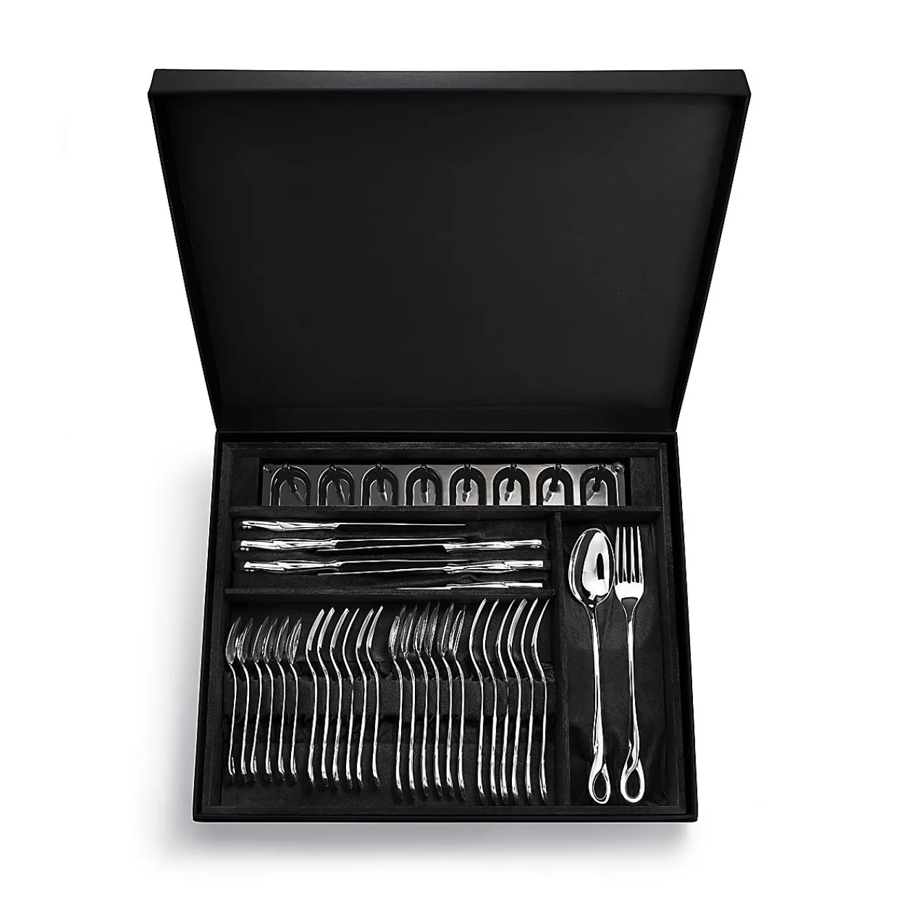 Tiffany & Co. Elsa Peretti® Padova™ 32-piece flatware set in sterling silver. | ^ Elsa Peretti®|The Couple