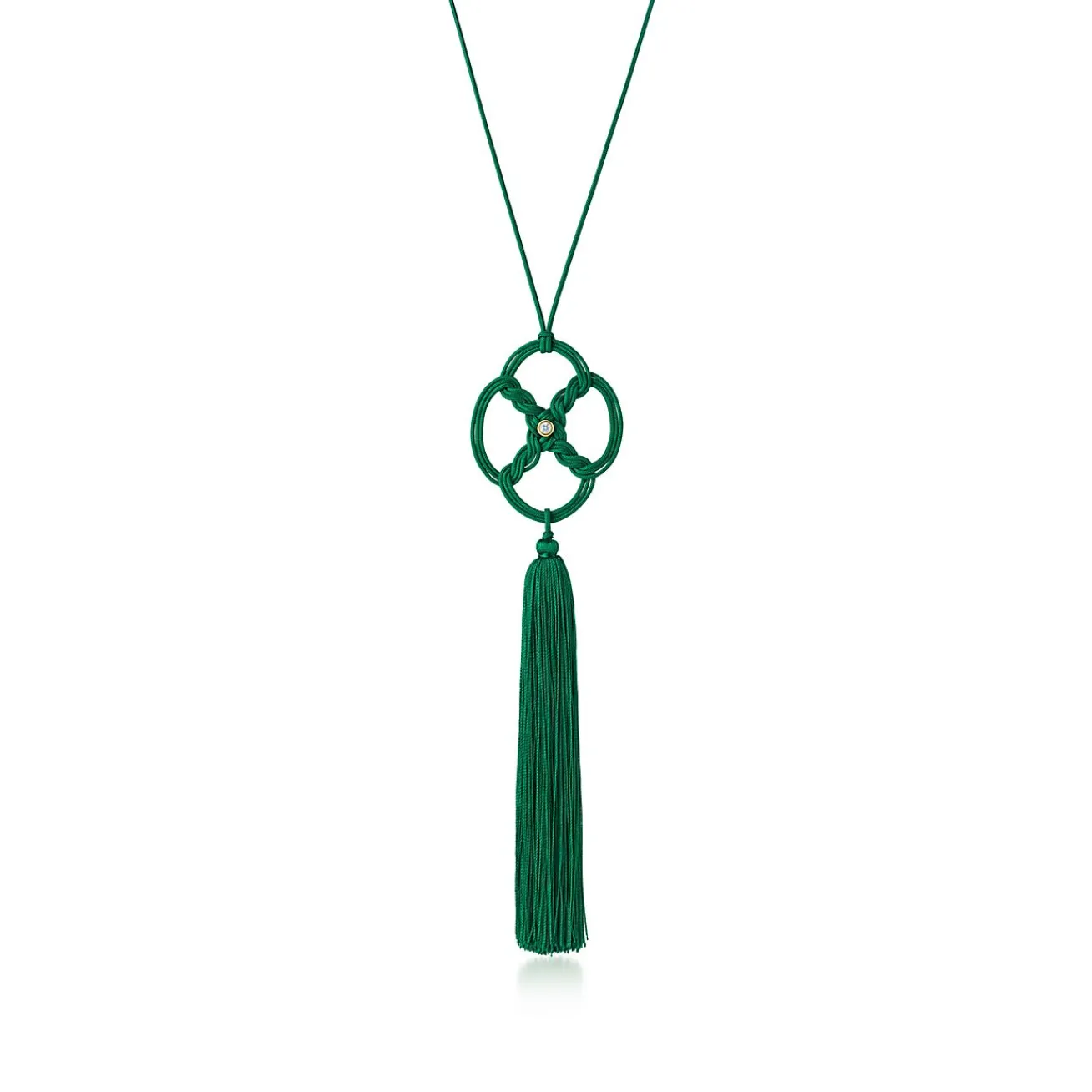 Tiffany & Co. Elsa Peretti® Quadrifoglio™ pendant with a diamond in gold on a green silk cord. | ^ Necklaces & Pendants|Diamond Jewelry