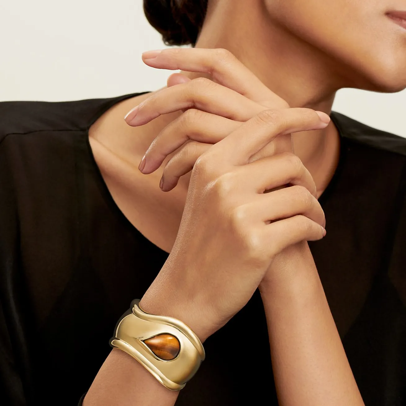 Tiffany & Co. Elsa Peretti® Small Bone Cuff in Yellow Gold with Tiger's Eye, 43 mm Wide | ^ Bracelets|Gold Jewelry