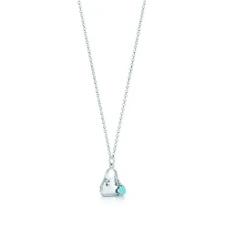 Tiffany & Co. Handbag charm with Tiffany Blue® enamel finish in sterling silver on a chain. | ^ Sterling Silver Jewelry