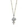 Tiffany & Co. Jean Schlumberger diamond flower pendant in 18k gold and platinum. | ^ Jean Schlumberger by Tiffany