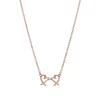 Tiffany & Co. Paloma Picasso® Double Loving Heart pendant in 18k rose gold with diamonds. | ^ Necklaces & Pendants|Rose Gold Jewelry