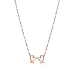 Tiffany & Co. Paloma Picasso® Double Loving Heart pendant in 18k rose gold with diamonds. | ^ Necklaces & Pendants|Rose Gold Jewelry