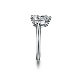 Tiffany & Co. Pear-shaped diamond engagement ring in platinum. | ^ Engagement Rings