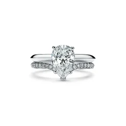 Tiffany & Co. Pear-shaped diamond engagement ring in platinum. | ^ Engagement Rings