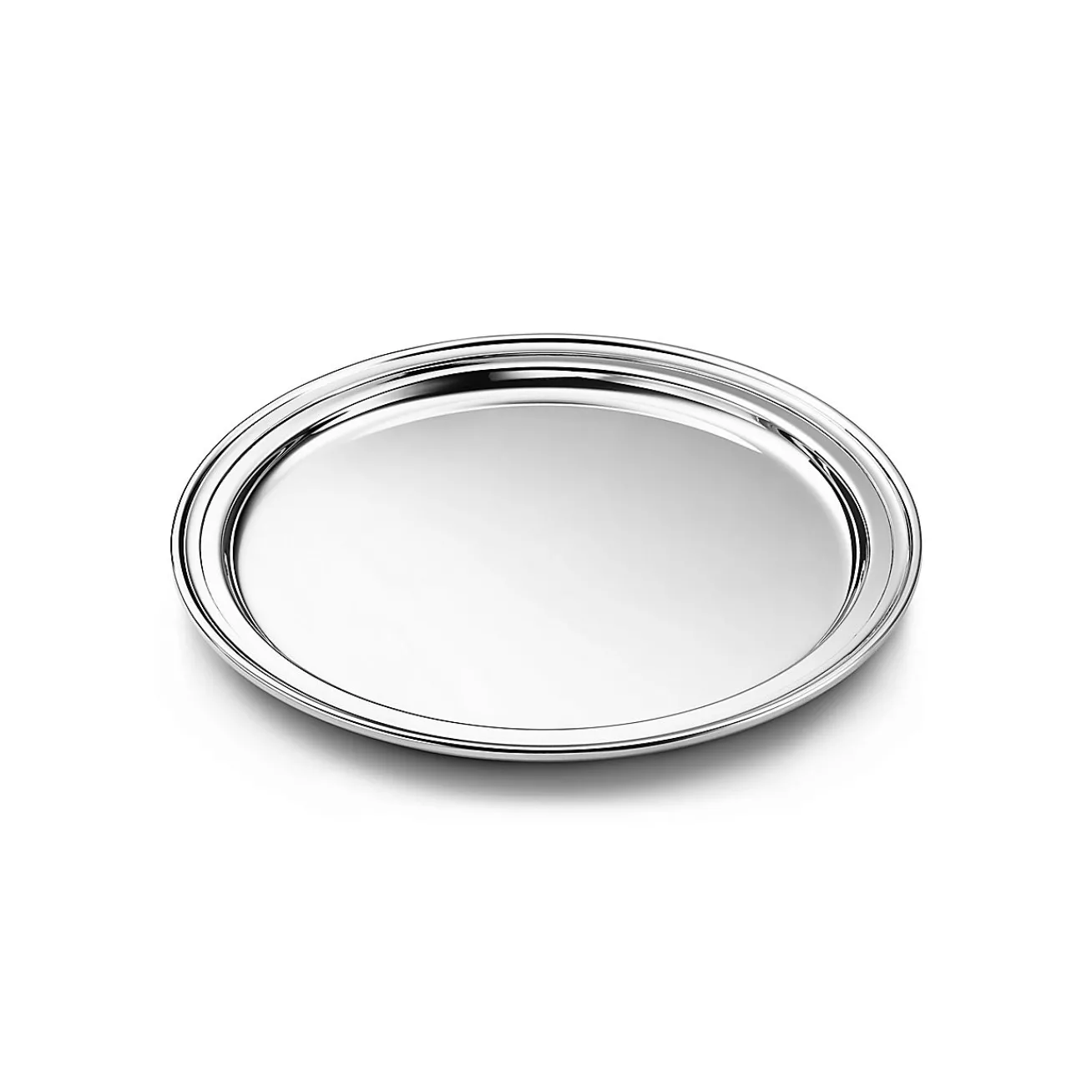 Tiffany & Co. Regency round tray in sterling silver. | ^ The Home|Housewarming Gifts