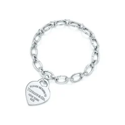 Tiffany & Co. Return to Tiffany™ heart tag charm in sterling silver on a bracelet. | ^ Bracelets|Sterling Silver Jewelry