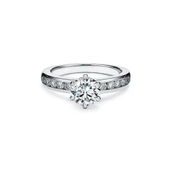 Tiffany & Co. The Tiffany® Setting with a diamond band: world's most iconic engagement ring. | ^ Engagement Rings