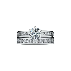 Tiffany & Co. The Tiffany® Setting with a diamond band: world's most iconic engagement ring. | ^ Engagement Rings