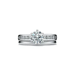 Tiffany & Co. The Tiffany® Setting with a diamond band: world's most iconic engagement ring. | ^ Engagement Rings