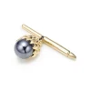 Tiffany & Co. Schlumberger® Acorn shirt stud in 18k gold with hematite. | ^ Jean Schlumberger by Tiffany