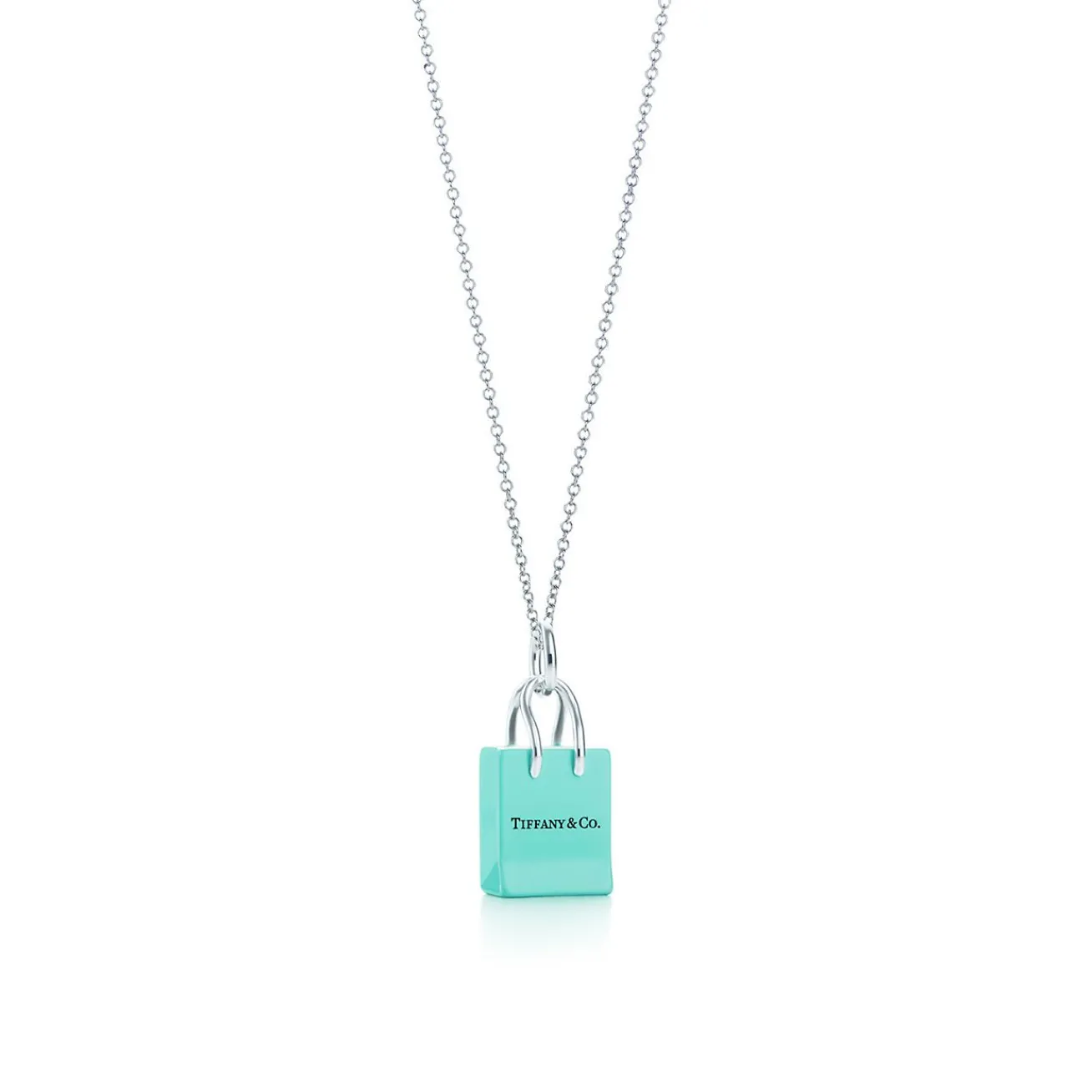 Tiffany & Co. ® shopping bag charm in sterling silver with enamel finish. | ^ Sterling Silver Jewelry|Tiffany Blue® Gifts