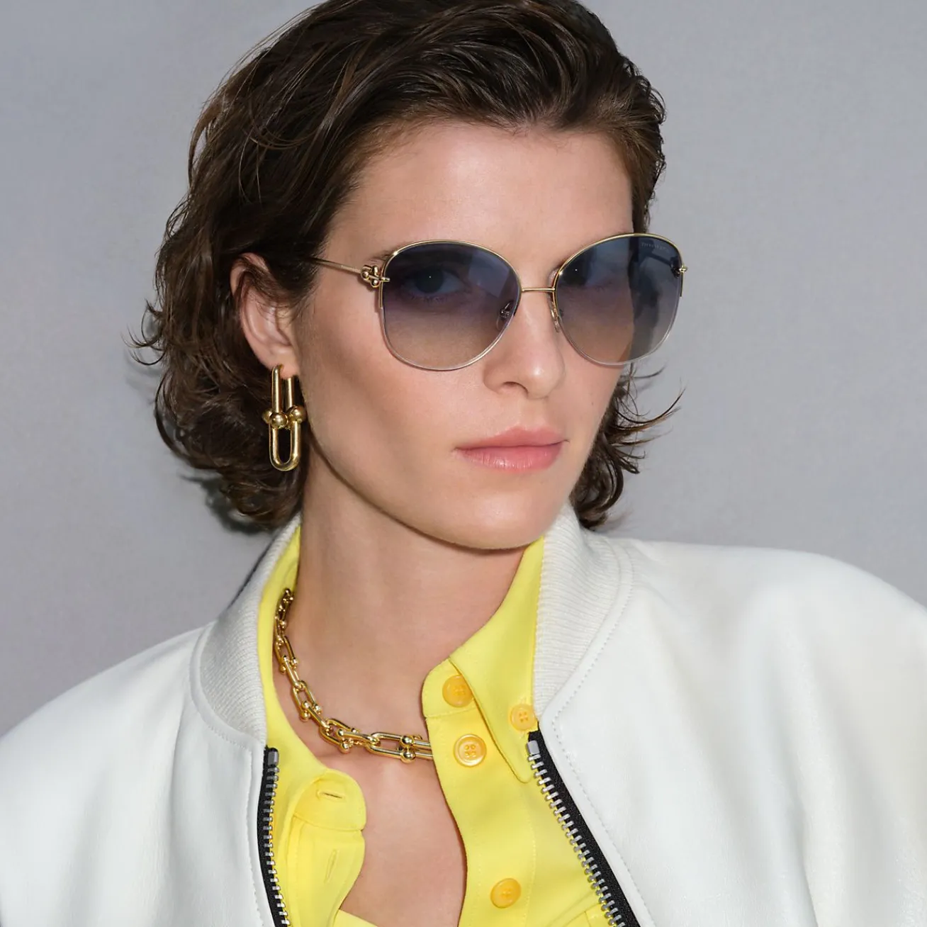 Tiffany & Co. Tiffany HardWear Sunglasses in Pale Gold-colored Metal with Blue Lenses | ^ Tiffany HardWear|Sunglasses