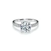 Tiffany & Co. Tiffany Harmony® engagement ring with a diamond band in platinum. | ^ Engagement Rings