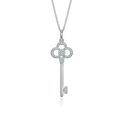 Tiffany & Co. Tiffany Keys crown key pendant with diamonds in 18k white gold on a chain. | ^ Diamond Jewelry
