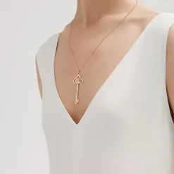 Tiffany & Co. Tiffany Keys fleur de lis key pendant in 18k rose gold with diamonds, large. | ^ Necklaces & Pendants|Rose Gold Jewelry