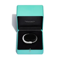 Tiffany & Co. Tiffany Lock Bangle in White Gold with Baguette and Pavé Diamonds | ^ Bracelets|Diamond Jewelry