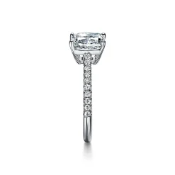 Tiffany & Co. Tiffany Novo® cushion-cut engagement ring with a pavé diamond band in platinum. | ^ Engagement Rings