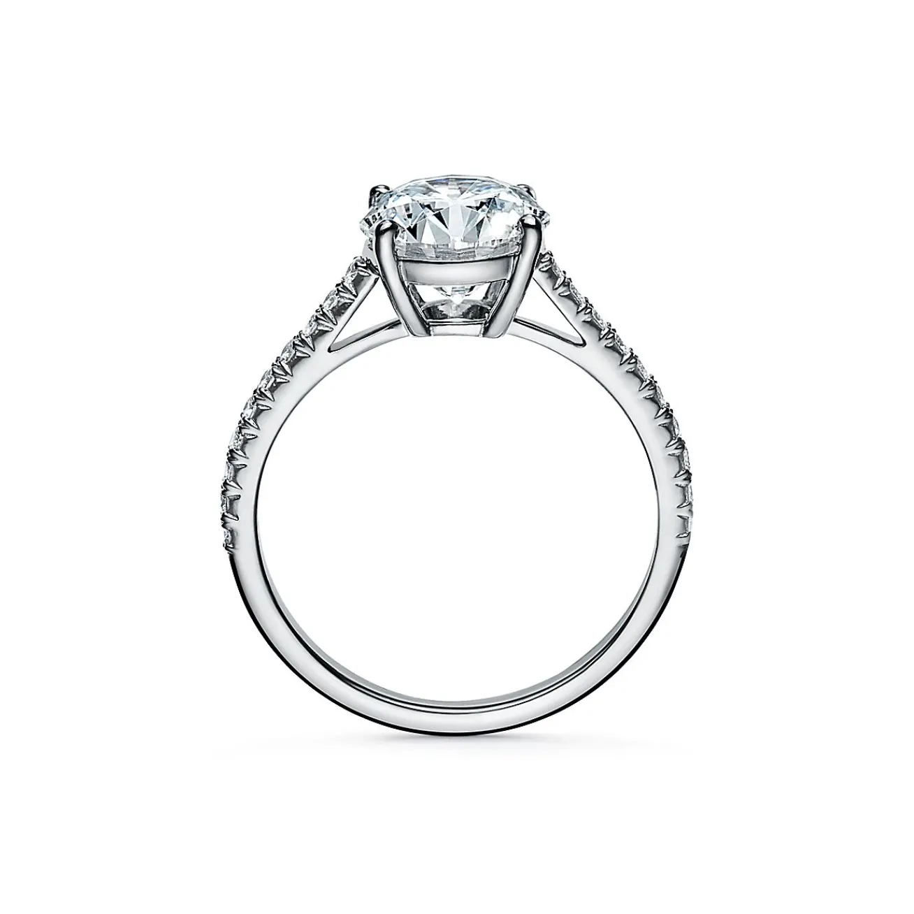 Tiffany & Co. Tiffany Novo® round brilliant engagement ring with a pavé diamond platinum band. | ^ Engagement Rings