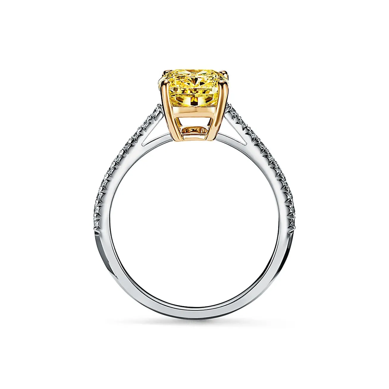 Tiffany & Co. Tiffany Novo® yellow diamond engagement ring with a pavé diamond platinum band. | ^ Engagement Rings