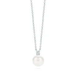 Tiffany & Co. Tiffany Signature® Pearls pendant in 18k white gold with a pearl and a diamond. | ^ Necklaces & Pendants|Diamond Jewelry