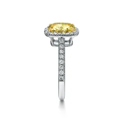 Tiffany & Co. Tiffany Soleste® cushion-cut engagement ring with a diamond band in platinum. | ^ Engagement Rings