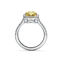 Tiffany & Co. Tiffany Soleste® cushion-cut engagement ring with a diamond band in platinum. | ^ Engagement Rings