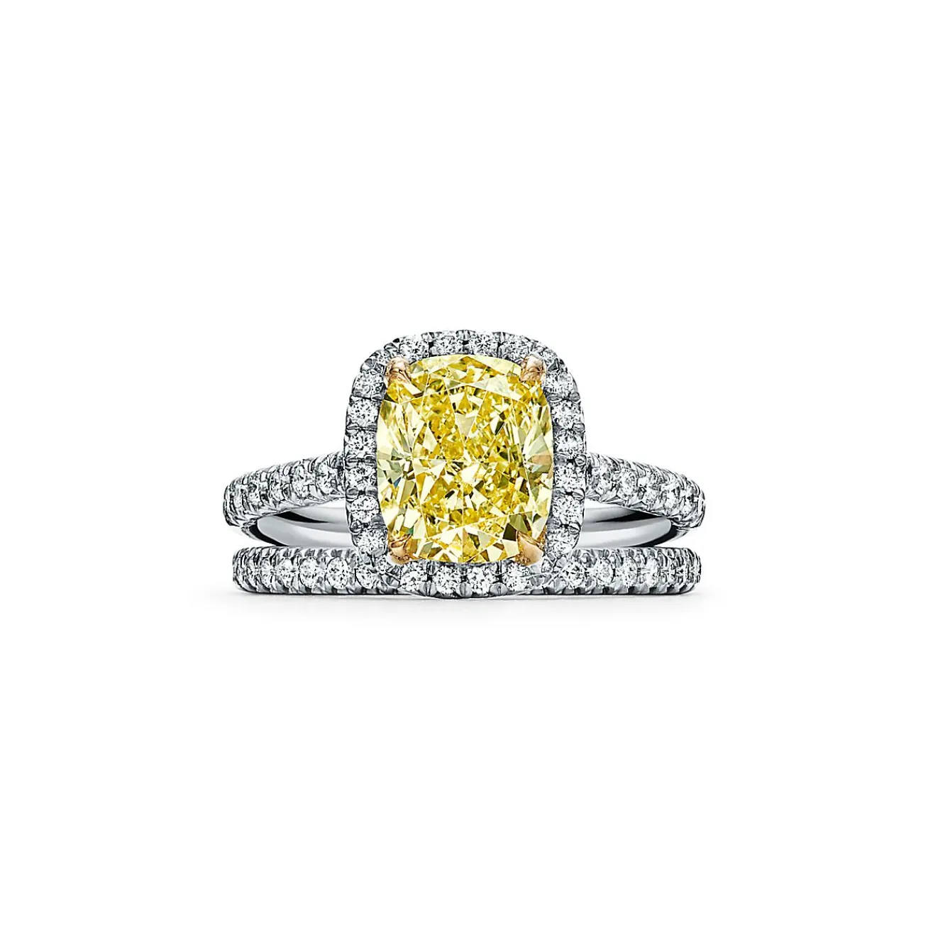 Tiffany & Co. Tiffany Soleste® cushion-cut engagement ring with a diamond band in platinum. | ^ Engagement Rings