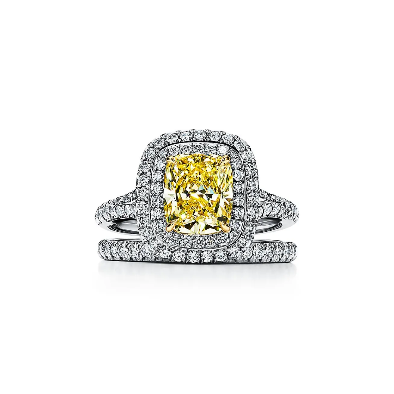Tiffany & Co. Tiffany Soleste® cushion-cut yellow diamond halo engagement ring in platinum. | ^ Engagement Rings