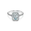 Tiffany & Co. Tiffany Soleste® emerald-cut halo engagement ring with a diamond platinum band. | ^ Engagement Rings