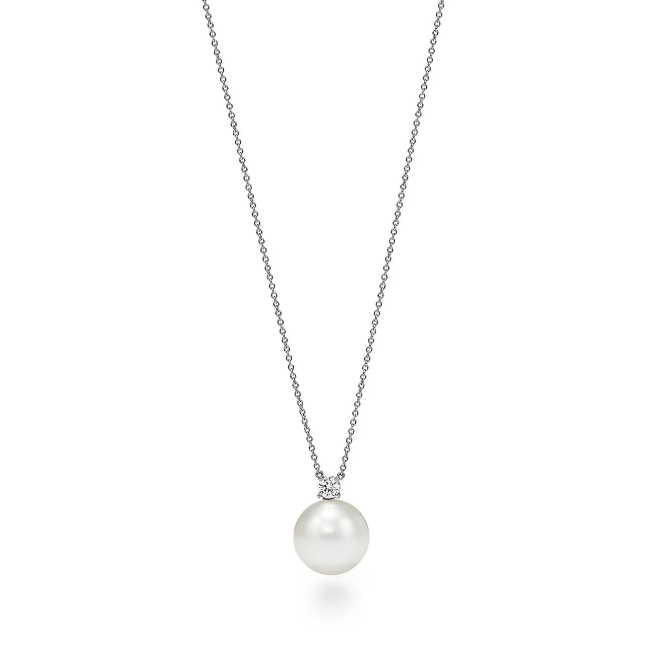 Tiffany & Co. Tiffany South Sea Noble pendant in platinum with a cultured pearl and a diamond. | ^ Necklaces & Pendants|Platinum Jewelry