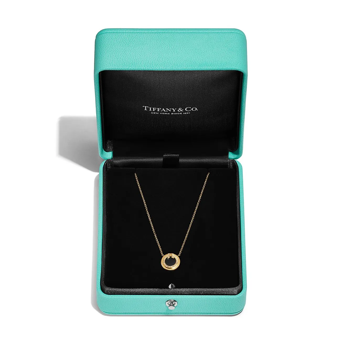 Tiffany & Co. Tiffany T diamond and black onyx circle pendant in 18k gold, small. | ^ Necklaces & Pendants|Men's Jewelry