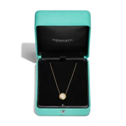 Tiffany & Co. Tiffany T diamond and mother-of-pearl circle pendant in 18k gold, small. | ^ Necklaces & Pendants|Gold Jewelry