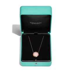 Tiffany & Co. Tiffany T diamond and pink opal circle pendant in 18k rose gold. | ^ Necklaces & Pendants|Rose Gold Jewelry