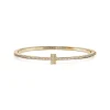 Tiffany & Co. Tiffany T diamond hinged wire bangle in 18k gold, medium. | ^ Bracelets|Gold Jewelry