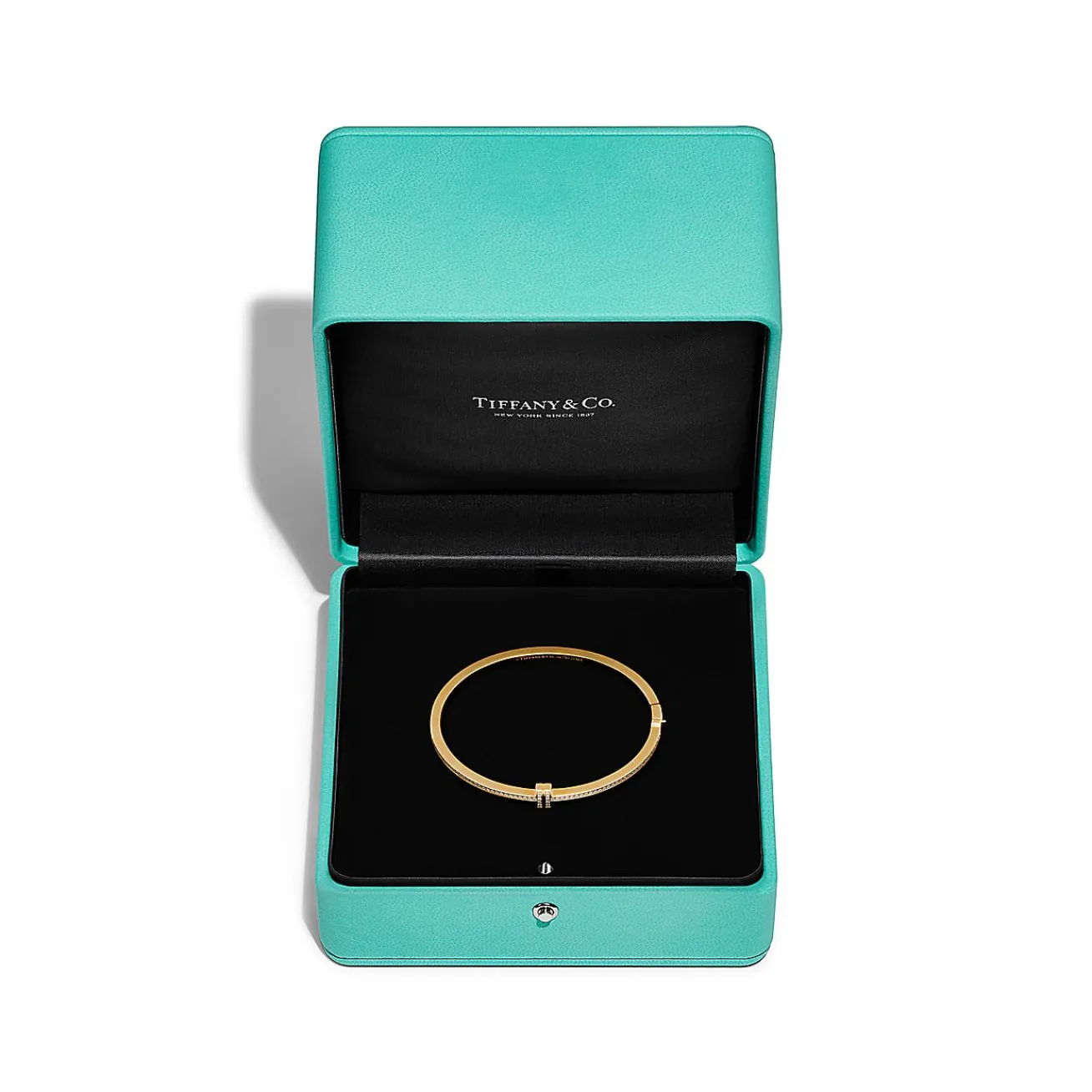 Tiffany & Co. Tiffany T diamond hinged wire bangle in 18k gold, medium. | ^ Bracelets|Gold Jewelry