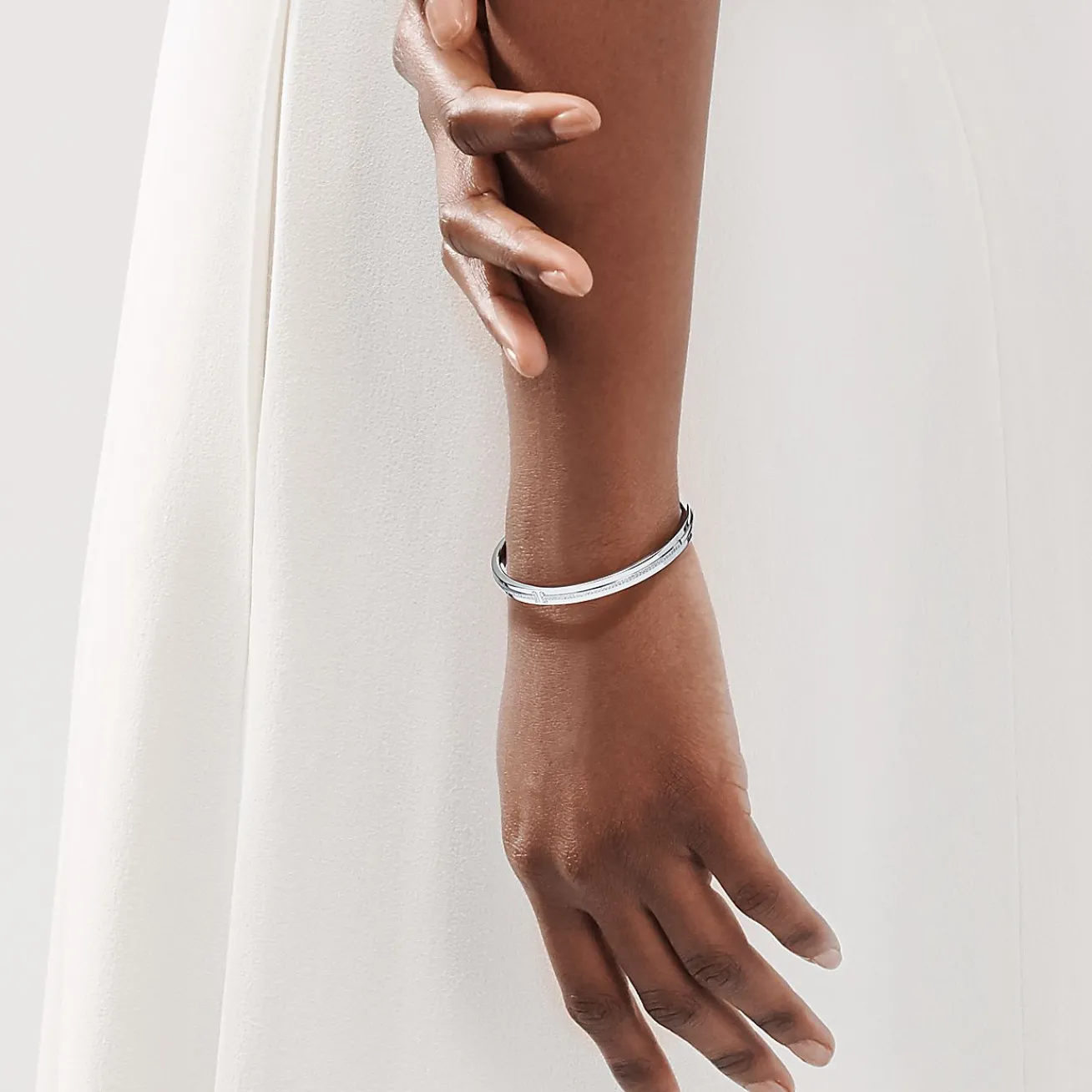 Tiffany & Co. Tiffany T diamond hinged bangle in 18k white gold, medium. | ^ Bracelets|Diamond Jewelry