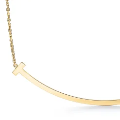 Tiffany & Co. Tiffany T extra large smile pendant in 18k gold. | ^ Necklaces & Pendants|Men's Jewelry