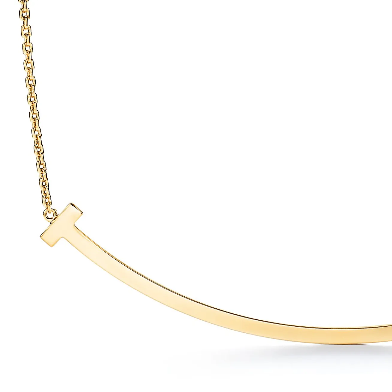 Tiffany & Co. Tiffany T extra large smile pendant in 18k gold. | ^ Necklaces & Pendants|Men's Jewelry