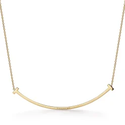 Tiffany & Co. Tiffany T extra large smile pendant in 18k gold with diamonds. | ^ Necklaces & Pendants|Men's Jewelry