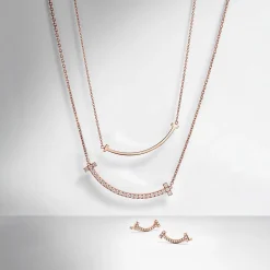 Tiffany & Co. Tiffany T medium smile pendant in 18k rose gold with diamonds. | ^ Necklaces & Pendants|Rose Gold Jewelry