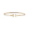 Tiffany & Co. Tiffany T narrow wire bracelet in 18k gold, medium. | ^ Bracelets|Gifts for Her